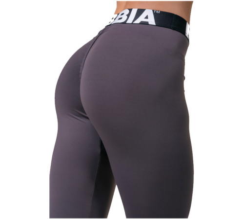 Жіночі легінси середньої посадки Nebbia Squat Hero Scrunch Butt 571 - розмір XS/фіолетовий Жіночі легінси середньої посадки Nebbia Squat Hero Scrunch Butt 571 - розмір XS/фіолетовий