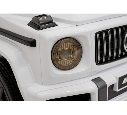 Дитяча акумуляторна машинка Mercedes AMG G63. Біла Дитяча акумуляторна машинка Mercedes AMG G63. Біла