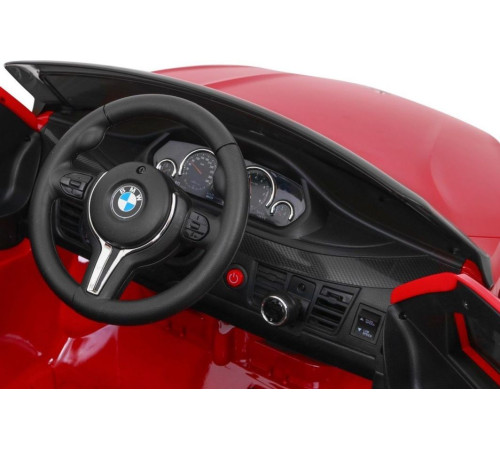 Дитяча акумуляторна машинка BMW X6M Червона Дитяча акумуляторна машинка BMW X6M Червона