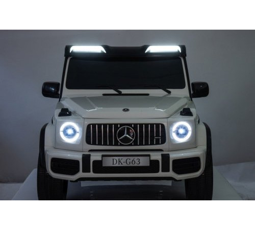 Дитяча акумуляторна машинка Mercedes Benz G63 AMG XXL Біла Дитяча акумуляторна машинка Mercedes Benz G63 AMG XXL Біла