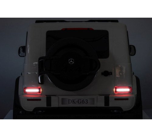 Дитяча акумуляторна машинка Mercedes Benz G63 AMG XXL Біла Дитяча акумуляторна машинка Mercedes Benz G63 AMG XXL Біла