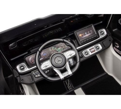 Дитяча акумуляторна машинка Mercedes Benz G63 AMG XXL Біла Дитяча акумуляторна машинка Mercedes Benz G63 AMG XXL Біла