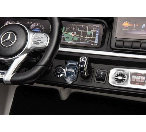 Дитяча акумуляторна машинка Mercedes Benz G63 AMG XXL Біла Дитяча акумуляторна машинка Mercedes Benz G63 AMG XXL Біла