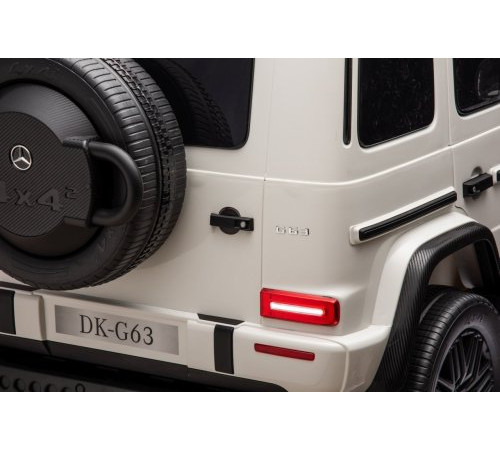 Дитяча акумуляторна машинка Mercedes Benz G63 AMG XXL Біла Дитяча акумуляторна машинка Mercedes Benz G63 AMG XXL Біла