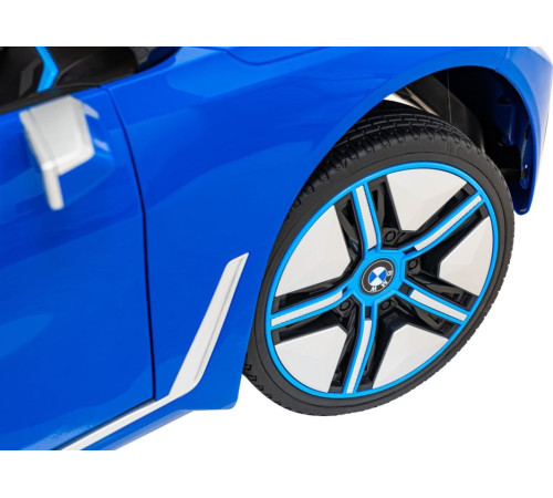 Дитяча акумуляторна машинка BMW i4 Синя Дитяча акумуляторна машинка BMW i4 Синя