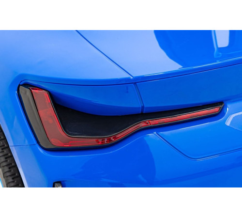 Дитяча акумуляторна машинка BMW i4 Синя Дитяча акумуляторна машинка BMW i4 Синя